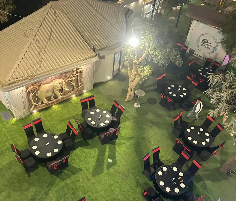 Wedding lawn lit at night at Hotel J P Farm, Jhansi
